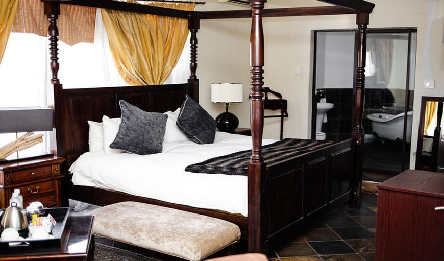Executive Rooms: Executive Rooms - Bedroom with a king size bed