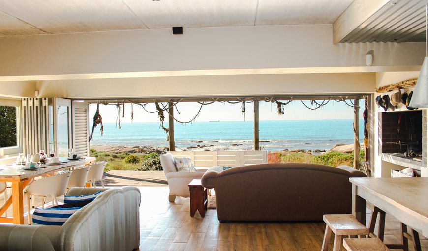 Open plan living area with a stunning view of the ocean.