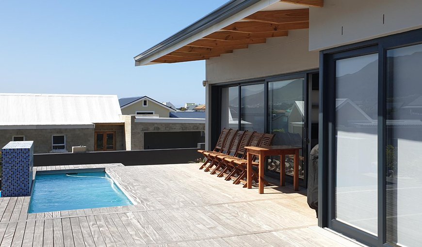 House features accommodation with an outdoor swimming pool and a patio