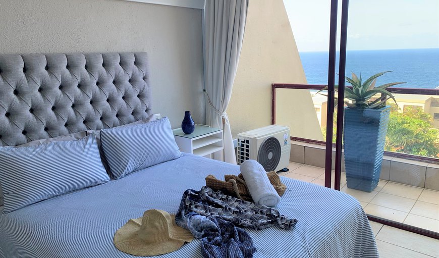Escape To An Oceanview Vacation Home: Wake up to the Ocean! The Master bedroom suite has a queen sized bed, aircon and leads onto it's own private balcony