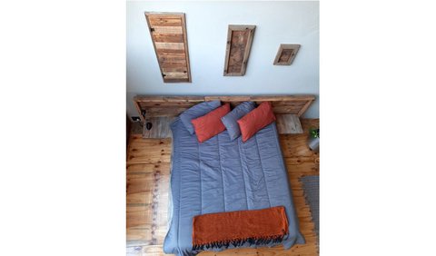 Loft Apartment: Little Forest Farm Loft Apartment - Open plan area with a queen size bed