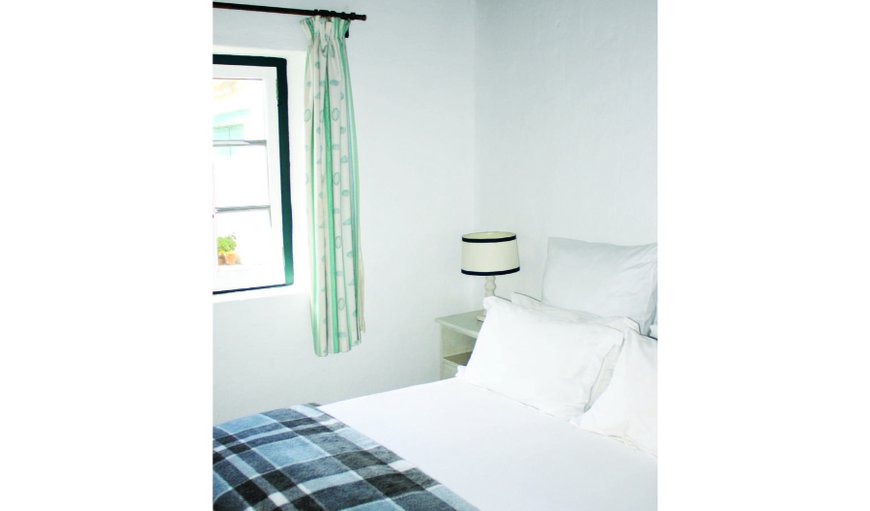 Self catering cottage: Bedroom with queen size bed