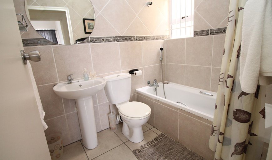 Michael Point 10: The en-suite bathroom has a bath as well as a hand shower