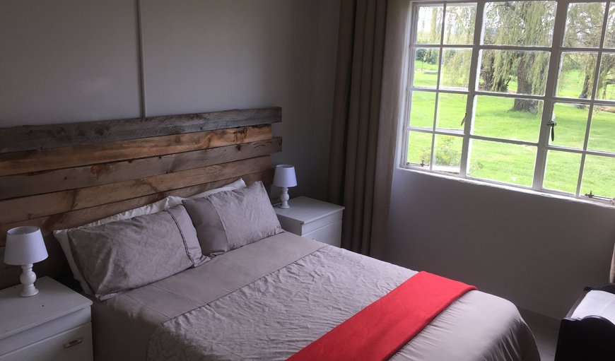 Meshlynn Farm Cottage: Bedroom 1 with a  double bed