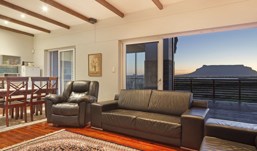 Upstairs, this incredible home has an additional full kitchen, dining area and lounge with another flat-screen TV Upstairs, this incredible home has an additional full kitchen, dining area and lounge with another flat-screen TV