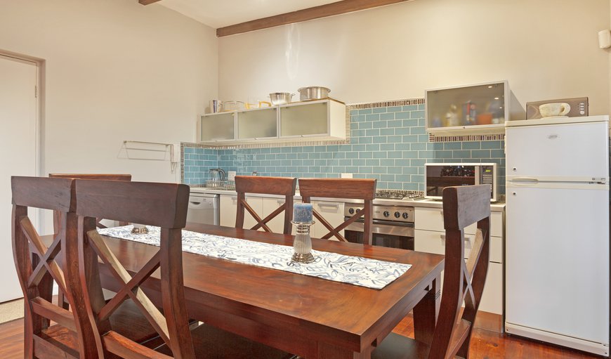 Upstairs, this incredible home has an additional full kitchen, dining area and lounge with another flat-screen TV Upstairs, this incredible home has an additional full kitchen, dining area and lounge with another flat-screen TV