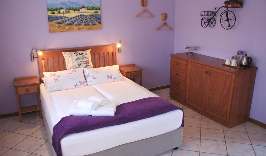 Family Unit: Lavender family unit with a double room (with DStv), a twin room and an interleading bathroom with shower / WC. The Unit offers ceiling fans, hairdryer, safe, tea and coffee making facilities, soap and shower gel and electric blankets in winter.