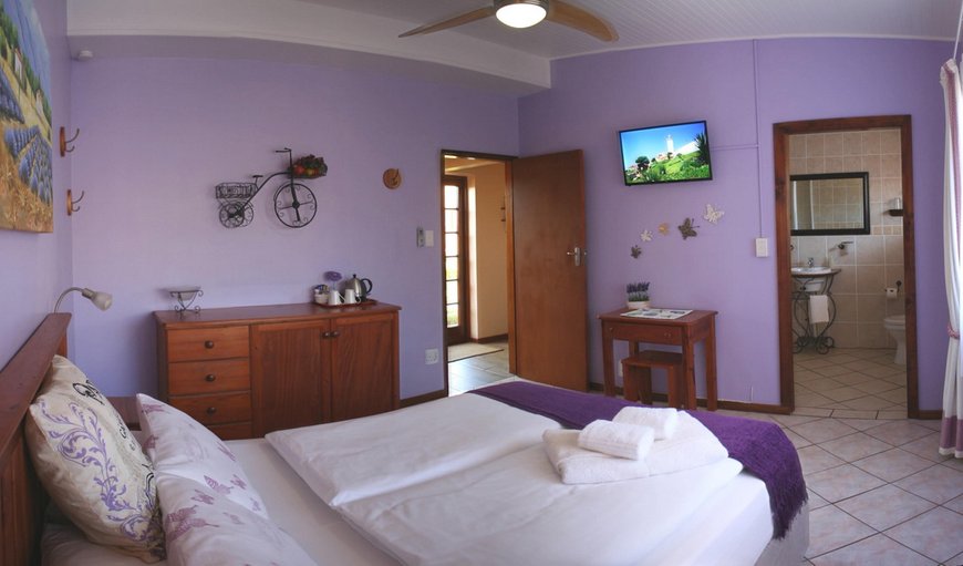 Family Unit: Lavender family unit with a double room (with DStv), a twin room and an interleading bathroom with shower / WC. The Unit offers ceiling fans, hairdryer, safe, tea and coffee making facilities, soap and shower gel and electric blankets in winter.