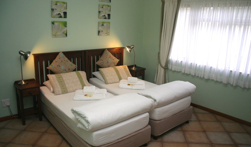 Lavender family unit with a double room (with DStv), a twin room and an interleading bathroom with shower / WC. The Unit offers ceiling fans, hairdryer, safe, tea and coffee making facilities, soap and shower gel and electric blankets in winter. Lavender family unit with a double room (with DStv), a twin room and an interleading bathroom with shower / WC. The Unit offers ceiling fans, hairdryer, safe, tea and coffee making facilities, soap and shower gel and electric blankets in winter.