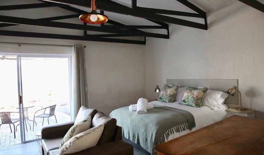 Paternoster Rentals - The moorings 1: Bedroom with a queen size bed