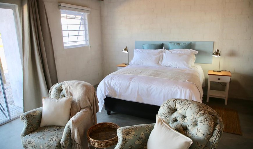 Paternoster Rentals - The moorings 2: Bedroom with a queen size bed
