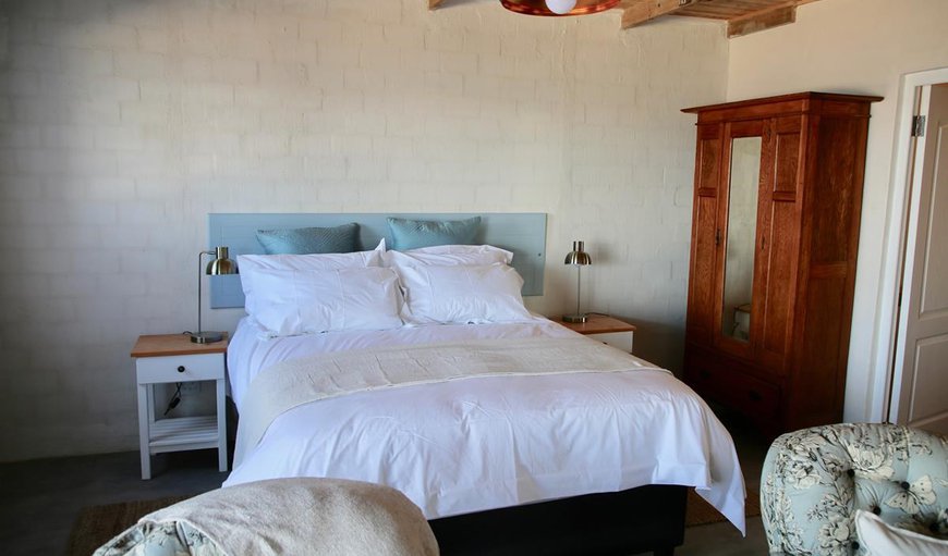 Paternoster Rentals - The moorings 2: Bedroom with a queen size bed