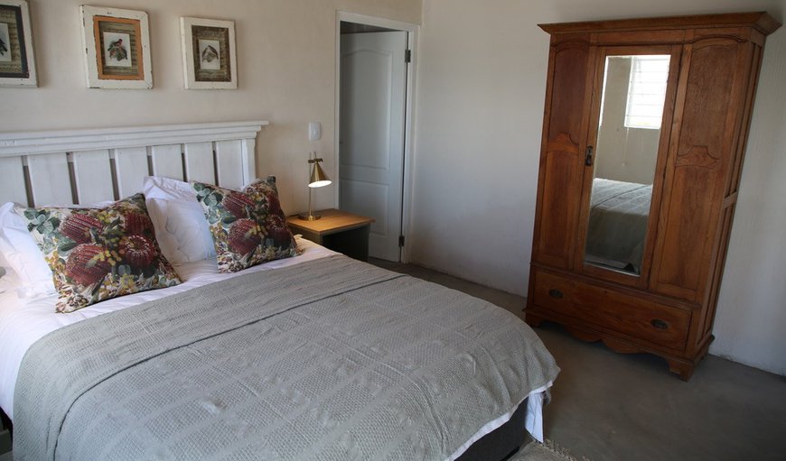 Paternoster Rentals - The Moorings 3: Bedroom with a queen size bed