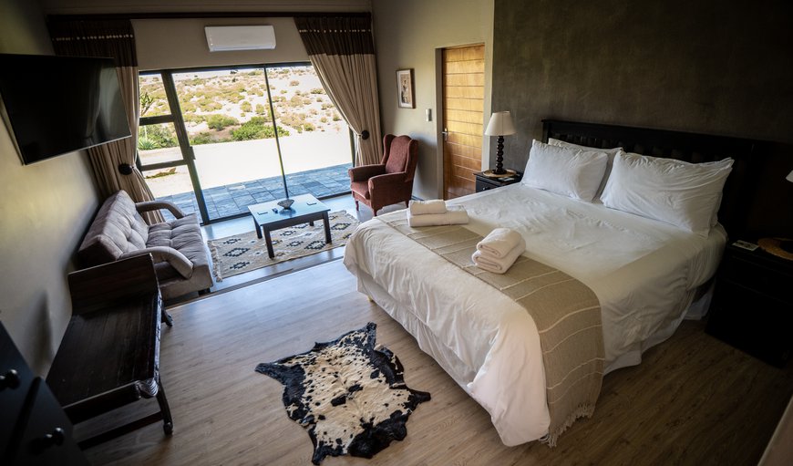 De Luxe Rooms feature, seating areas, private terraces, bean to cup coffee machines and bar fridges. De Luxe Rooms feature, seating areas, private terraces, bean to cup coffee machines and bar fridges.