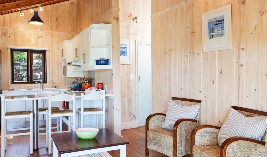 Maerose Hillside Chalet: Open-plan kitchen and living room