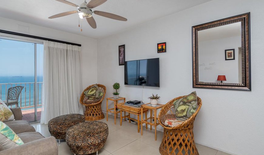 The lounge area is tastefully furnished with comfortable couches and a TV with DSTV and a DVD player. The lounge area is tastefully furnished with comfortable couches and a TV with DSTV and a DVD player.