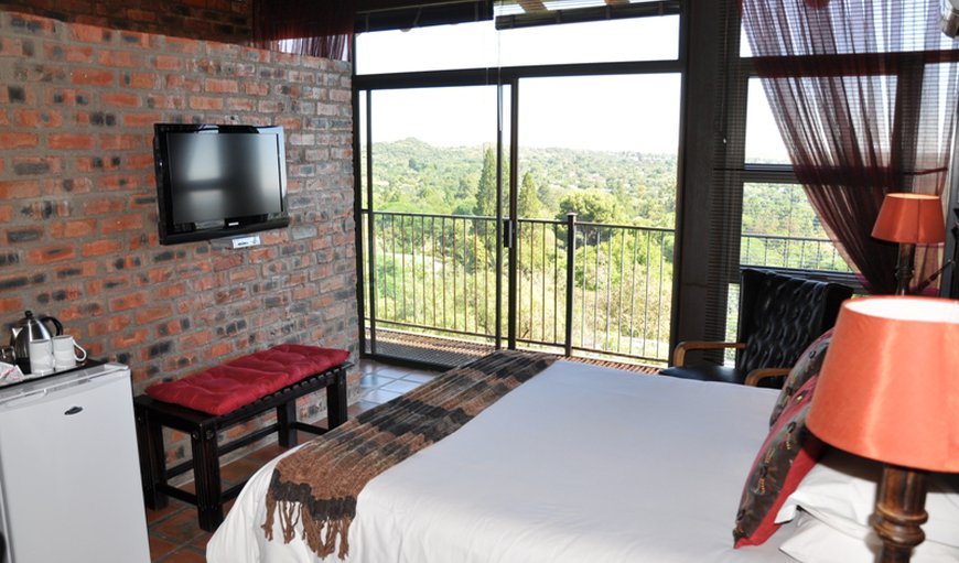 Luxury Room with a View (Style B): Luxury Room with a View (Style B) - This air conditioned room offers a queen size bed, flat screen TV, mini fridge, safe, tea/coffee making facilities and an en-suite bathroom.