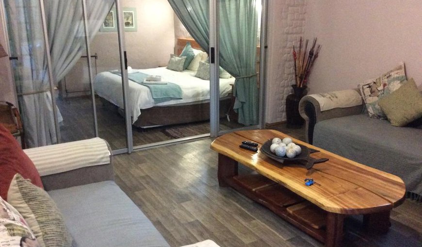 African Dreams - The cottage contains a king size bed with a bunk bed and a fully equipped kitchenette. African Dreams - The cottage contains a king size bed with a bunk bed and a fully equipped kitchenette.
