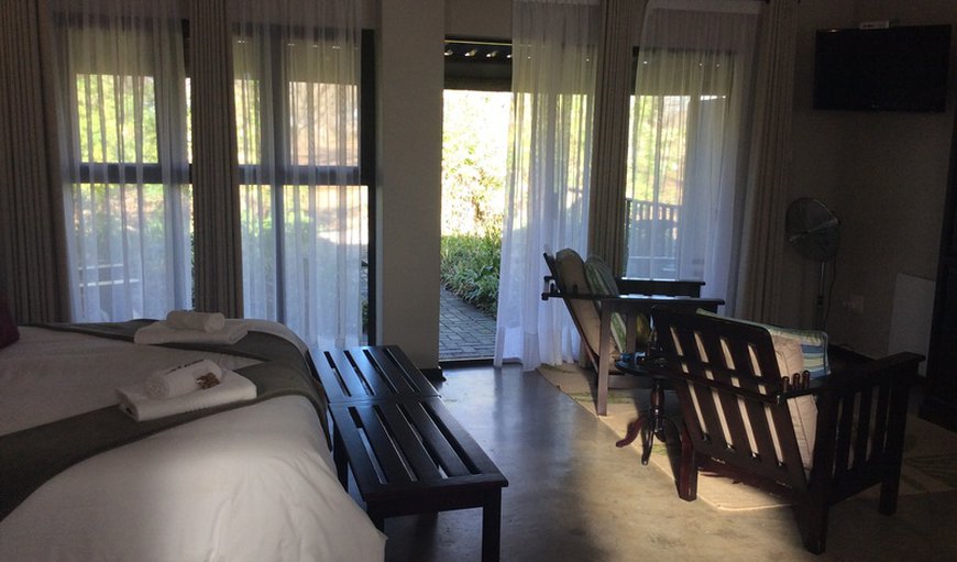 Peace Room - This spacious open plan room offers a king size bed or two single beds with an open shower and private toilet. Peace Room - This spacious open plan room offers a king size bed or two single beds with an open shower and private toilet.