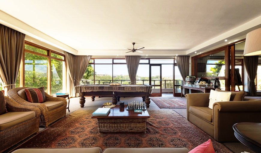 Wilderness Manor is luxuriously decorated in an African colonial style with fine oriental rugs, family heirlooms, antiques, art, books and collectables which contribute to a refined and stylish ambience. Wilderness Manor is luxuriously decorated in an African colonial style with fine oriental rugs, family heirlooms, antiques, art, books and collectables which contribute to a refined and stylish ambience.