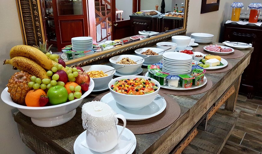 Continental buffet and English breakfast served in our breakfast room, opening onto a sunny balcony overlooking the indigenous forest where the Knysna Loerie often comes to feed... Continental buffet and English breakfast served in our breakfast room, opening onto a sunny balcony overlooking the indigenous forest where the Knysna Loerie often comes to feed...