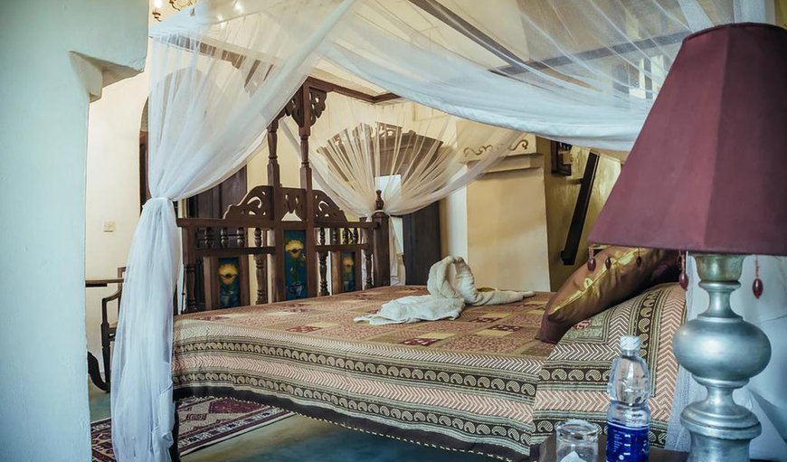 Cappuccino deluxe bedroom suite - tastefully decorated adding an exotic flare to your holiday