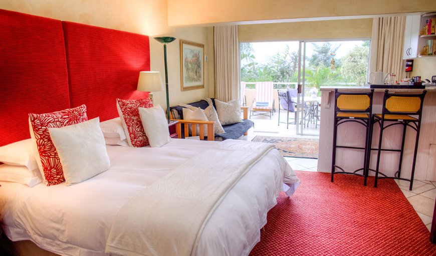 Strelitzia Room- Large, luxuriously appointed room with king size bed, modern en-suite bathroom, lounge area & kitchenette Strelitzia Room- Large, luxuriously appointed room with king size bed, modern en-suite bathroom, lounge area & kitchenette