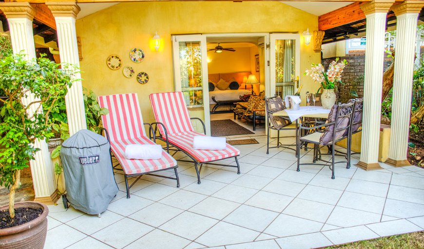 Cheetah Room- The room opens onto a large private patio complete with sun loungers, barbecue and outside entertainment area. Cheetah Room- The room opens onto a large private patio complete with sun loungers, barbecue and outside entertainment area.