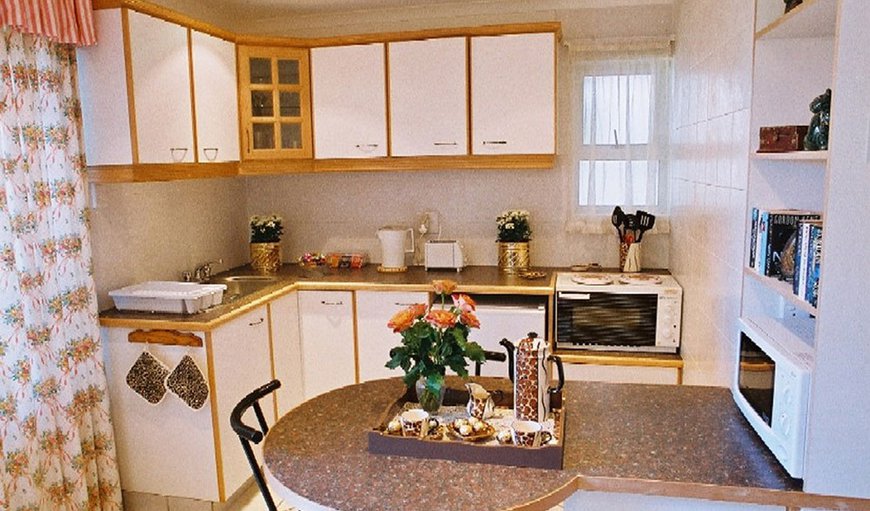 CHEETAH SELF-CATERING- well fitted kitchenette with excellent self-catering facilities makes this very private room ideal for those guests who want to relax in a beautiful garden area. CHEETAH SELF-CATERING- well fitted kitchenette with excellent self-catering facilities makes this very private room ideal for those guests who want to relax in a beautiful garden area.