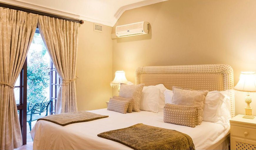 Family Suite: The family room is a 2 bedroom unit with a double bed in one room and kingsize  (which can be made into 2 single beds) in the other room.  A full bathroom/shower plus a separate toilet is shared between the 2 rooms.
