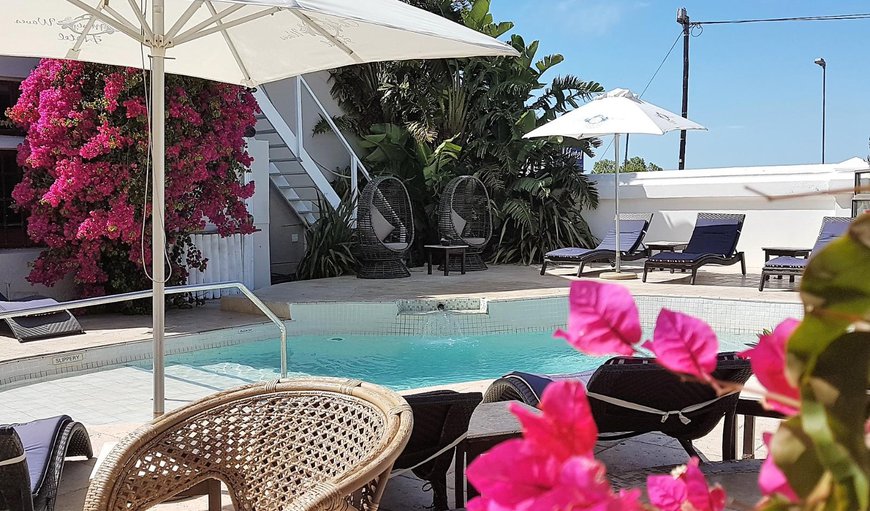 A swimming pool is situated at the front of the hotel set in the tranquil gardens, where guests can relax in the sun A swimming pool is situated at the front of the hotel set in the tranquil gardens, where guests can relax in the sun