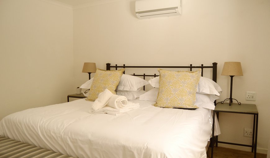 Luxury Self Catering Chalet - The main bedroom is fully air conditioned with a king size bed and a modern bathroom with a shower. Luxury Self Catering Chalet - The main bedroom is fully air conditioned with a king size bed and a modern bathroom with a shower.