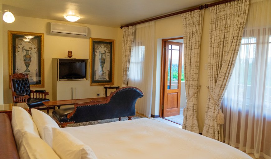 Superior Garden Suite: Garden Suite - Bedroom with a king size bed