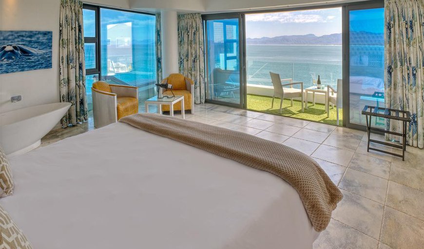 Luxury Sea Facing Room: Luxury Sea Facing Room - A spacious open plan bedroom with a king size bed, full HD TV with a Nespresso machine, tea facilities and a freestanding designer bathtub.