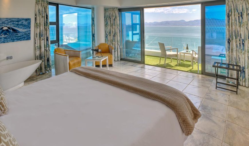 Luxury Sea Facing Room - A spacious open plan bedroom with a king size bed, full HD TV with a Nespresso machine, tea facilities and a freestanding designer bathtub. Luxury Sea Facing Room - A spacious open plan bedroom with a king size bed, full HD TV with a Nespresso machine, tea facilities and a freestanding designer bathtub.