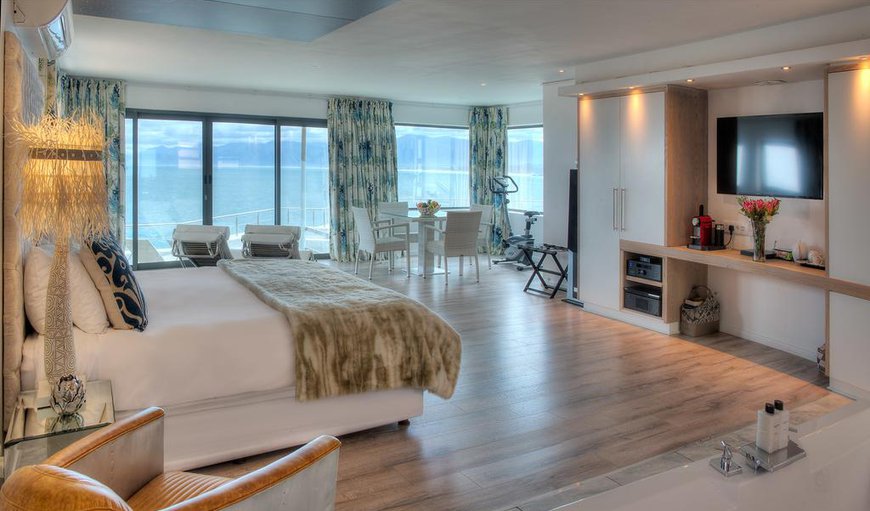 Sea Facing Penthouse Suite - The living area offers two leather loungers with a 60-inch LCD screen, Blu Ray player and Movie Center. Sea Facing Penthouse Suite - The living area offers two leather loungers with a 60-inch LCD screen, Blu Ray player and Movie Center.