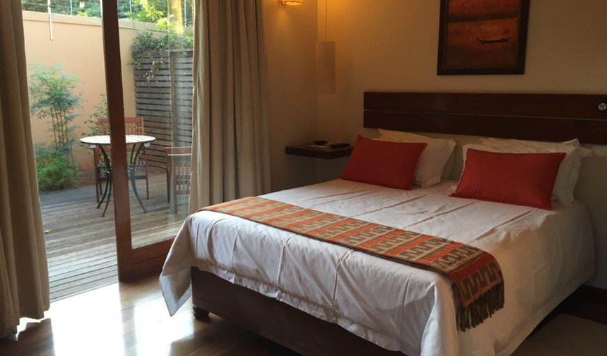 Standard Rooms - Each room sleeps two guests comfortably and features a private patio and an en-suite bathroom. Standard Rooms - Each room sleeps two guests comfortably and features a private patio and an en-suite bathroom.
