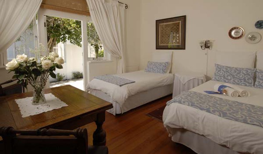 A large upstairs family unit with a king size bed and two single beds, a kitchenette and two bathrooms, one with a shower, washbasin, toilet and one with a bath, washbasin, toilet etc. It overlooks the pool and there is a small balcony. It it fully equipped with microwave, fridge, ceiling fans, crockery etc. There also DSTV, free WIFI and secure parking. A large upstairs family unit with a king size bed and two single beds, a kitchenette and two bathrooms, one with a shower, washbasin, toilet and one with a bath, washbasin, toilet etc. It overlooks the pool and there is a small balcony. It it fully equipped with microwave, fridge, ceiling fans, crockery etc. There also DSTV, free WIFI and secure parking.