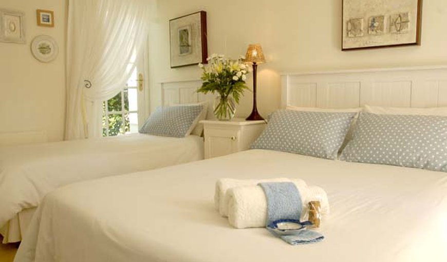 Twin room has a private entrance, 1x single bed and 1x double bed. The en-suite bathroom has a shower. Tea- and coffee-making facilities and a bar fridge included. Twin room has a private entrance, 1x single bed and 1x double bed. The en-suite bathroom has a shower. Tea- and coffee-making facilities and a bar fridge included.