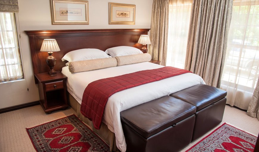 Pinotage Luxury Suite: Pinotage Luxury Suite - Bedroom with an extra length king size bed
